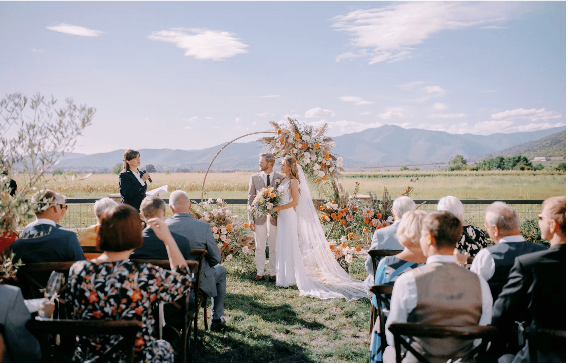 The grassy outdoor space where the ceremony will be held